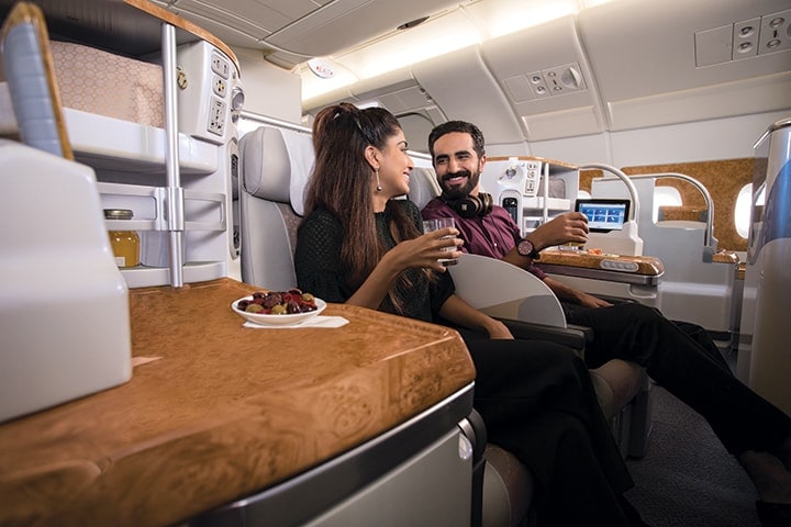 emirates-a380-business-class-seating-couple-chatting-720x480.jpeg